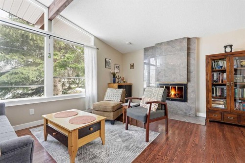4539 Vandergrift Crescent Nw, Calgary, AB - Indoor Photo Showing Living Room With Fireplace