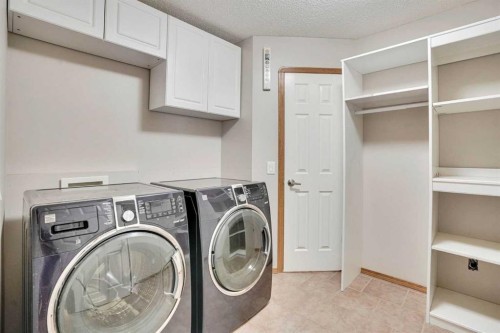 143 Country Hills View Nw, Calgary, AB - Indoor Photo Showing Laundry Room
