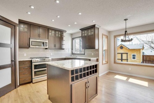 143 Country Hills View Nw, Calgary, AB - Indoor Photo Showing Kitchen With Stainless Steel Kitchen With Upgraded Kitchen