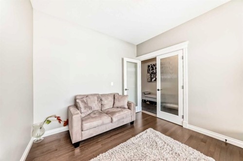 345 Marquis Landing Se, Calgary, AB - Indoor Photo Showing Living Room