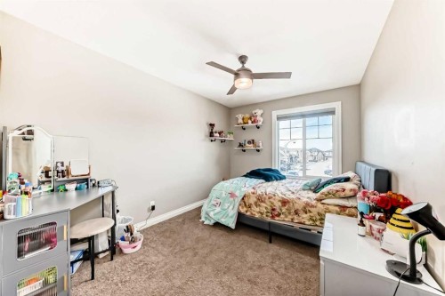 345 Marquis Landing Se, Calgary, AB - Indoor Photo Showing Bedroom