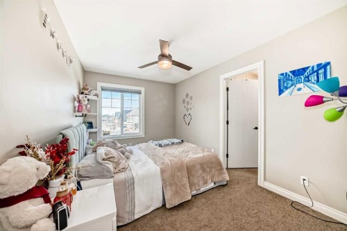 345 Marquis Landing Se, Calgary, AB - Indoor Photo Showing Bedroom