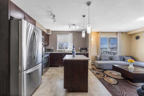 3306-279 Copperpond Common Se, Calgary, AB - Indoor Photo Showing Kitchen With Double Sink