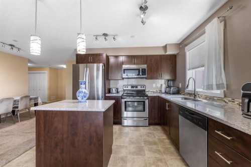 3306-279 Copperpond Common Se, Calgary, AB - Indoor Photo Showing Kitchen With Stainless Steel Kitchen With Double Sink With Upgraded Kitchen