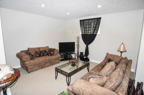 148 Scenic View Close Nw, Calgary, AB - Indoor Photo Showing Living Room