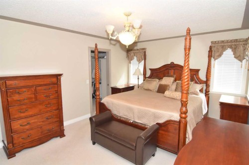 148 Scenic View Close Nw, Calgary, AB - Indoor Photo Showing Bedroom