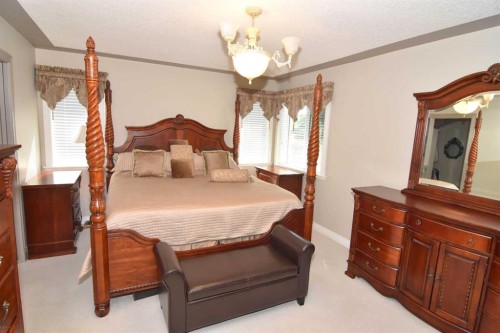 148 Scenic View Close Nw, Calgary, AB - Indoor Photo Showing Bedroom