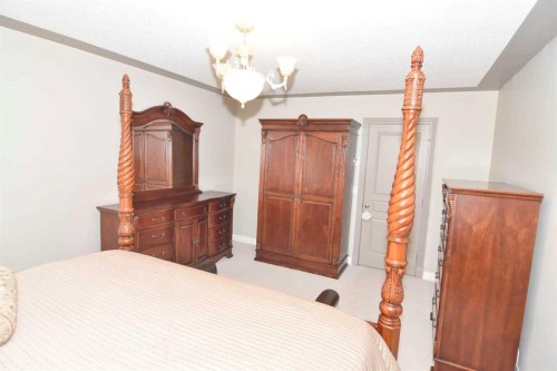 148 Scenic View Close Nw, Calgary, AB - Indoor Photo Showing Bedroom