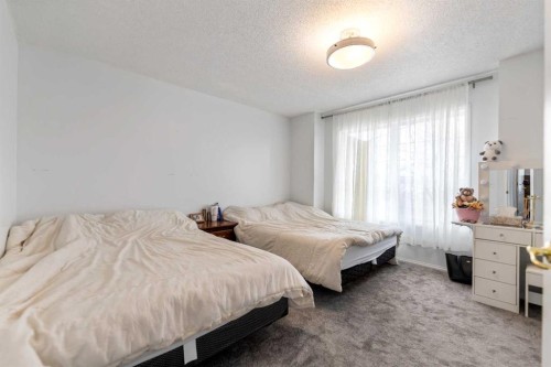 50 Taravista Gardens Ne, Calgary, AB - Indoor Photo Showing Bedroom