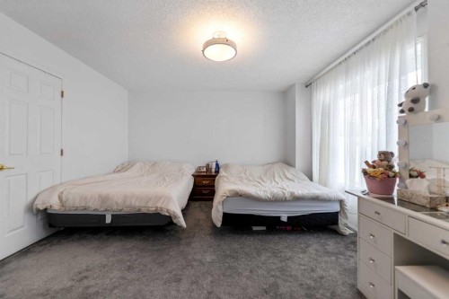 50 Taravista Gardens Ne, Calgary, AB - Indoor Photo Showing Bedroom