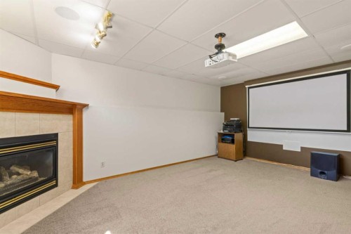 65 Canoe Circle Sw, Airdrie, AB - Indoor With Fireplace