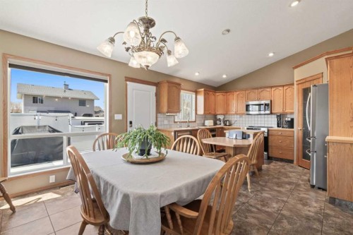 65 Canoe Circle Sw, Airdrie, AB - Indoor Photo Showing Dining Room