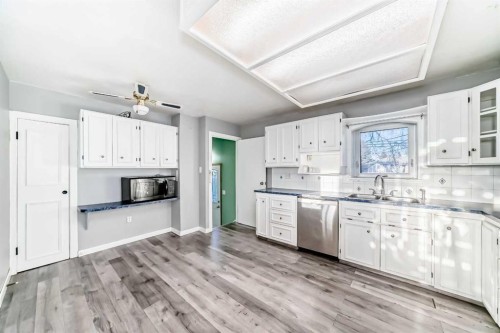 1511 43 Street Se, Calgary, AB - Indoor Photo Showing Kitchen With Double Sink