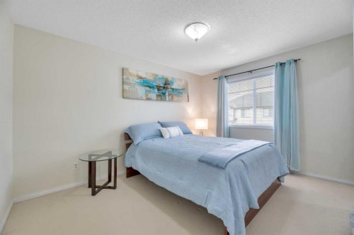 49 Everridge Gardens Sw, Calgary, AB - Indoor Photo Showing Bedroom