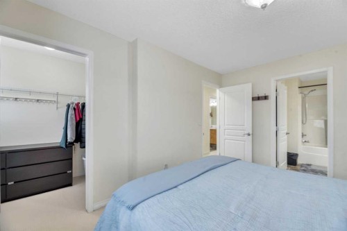 49 Everridge Gardens Sw, Calgary, AB - Indoor Photo Showing Bedroom