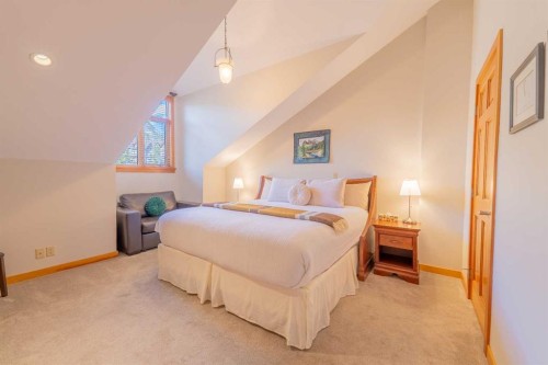 302-801 Benchlands Trail, Canmore, AB - Indoor Photo Showing Bedroom
