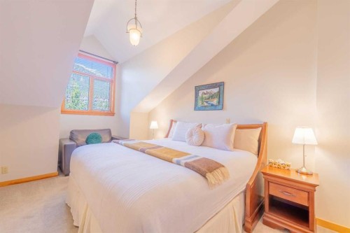 302-801 Benchlands Trail, Canmore, AB - Indoor Photo Showing Bedroom