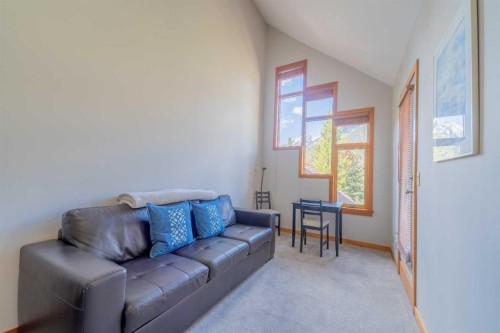 302-801 Benchlands Trail, Canmore, AB - Indoor Photo Showing Living Room