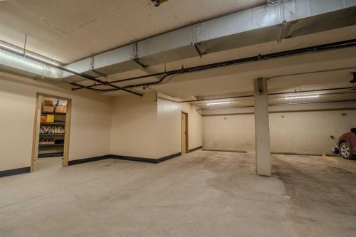 302-801 Benchlands Trail, Canmore, AB - Indoor Photo Showing Garage