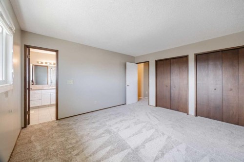 128 Silver Ridge, Calgary, AB - Indoor Photo Showing Other Room