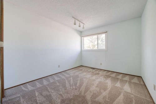 128 Silver Ridge, Calgary, AB - Indoor Photo Showing Other Room