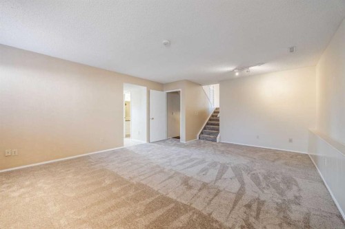 128 Silver Ridge, Calgary, AB - Indoor Photo Showing Other Room