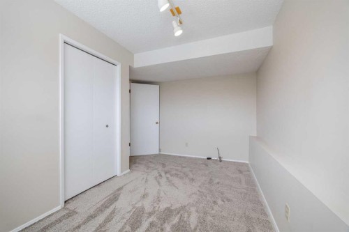 128 Silver Ridge, Calgary, AB - Indoor Photo Showing Other Room