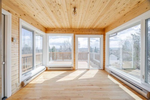 128 Silver Ridge, Calgary, AB - Indoor Photo Showing Other Room