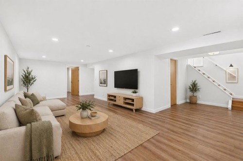 12 Glacier Drive Sw, Calgary, AB - Indoor Photo Showing Living Room