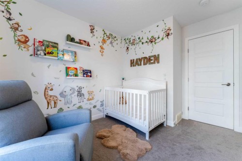 318 Masters Row Se, Calgary, AB - Indoor Photo Showing Bedroom