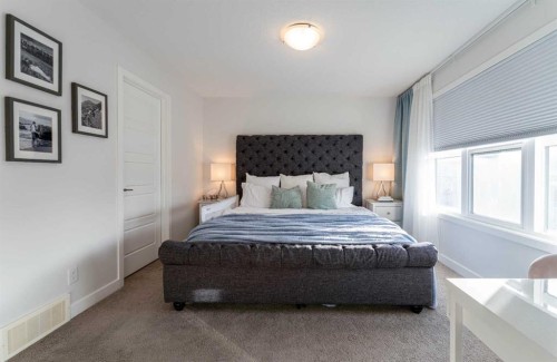 318 Masters Row Se, Calgary, AB - Indoor Photo Showing Bedroom