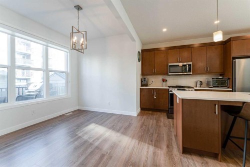 318 Masters Row Se, Calgary, AB - Indoor Photo Showing Kitchen With Stainless Steel Kitchen