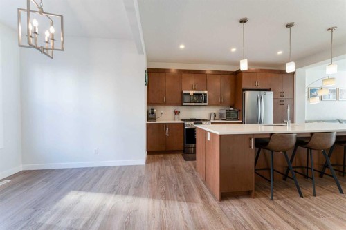 318 Masters Row Se, Calgary, AB - Indoor Photo Showing Kitchen With Stainless Steel Kitchen With Upgraded Kitchen
