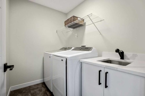 1073 Waterford Drive, Chestermere, AB - Indoor Photo Showing Laundry Room