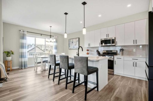 1073 Waterford Drive, Chestermere, AB - Indoor Photo Showing Kitchen With Upgraded Kitchen