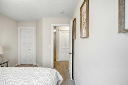 408-474 Seton Circle Se, Calgary, AB - Indoor Photo Showing Bedroom