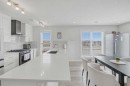 408-474 Seton Circle Se, Calgary, AB  - Indoor Photo Showing Kitchen With Upgraded Kitchen 