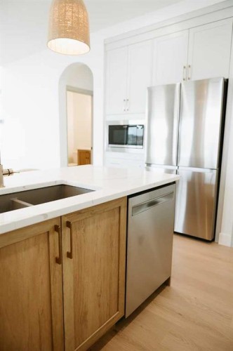 807 Lakewood Circle, Strathmore, AB - Indoor Photo Showing Kitchen With Stainless Steel Kitchen With Double Sink