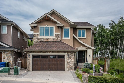 180 Ascot Drive Sw, Calgary, AB - Outdoor With Facade