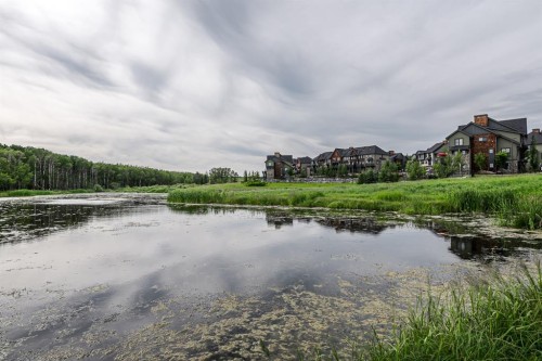 180 Ascot Drive Sw, Calgary, AB - Outdoor With Body Of Water With View