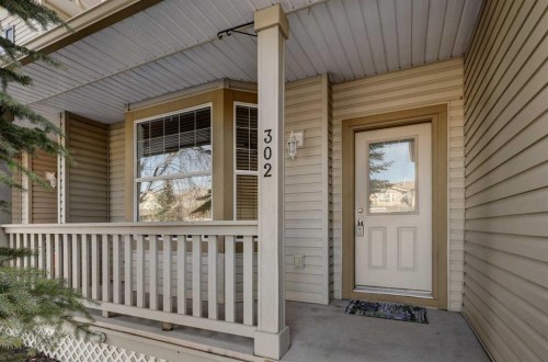 302-2006 Luxstone Boulevard Sw, Airdrie, AB - Outdoor With Deck Patio Veranda With Exterior