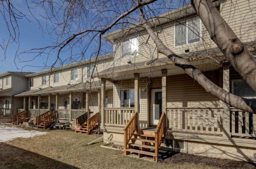 302-2006 Luxstone Boulevard Sw, Airdrie, AB - Outdoor With Deck Patio Veranda