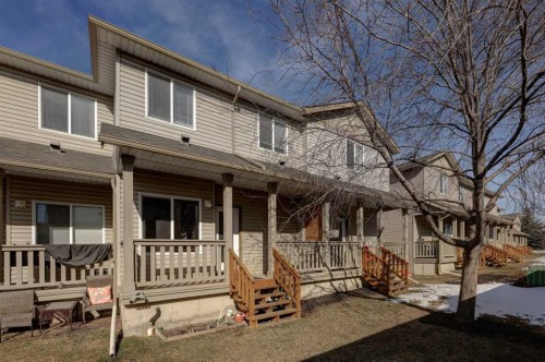 302-2006 Luxstone Boulevard Sw, Airdrie, AB - Outdoor With Deck Patio Veranda