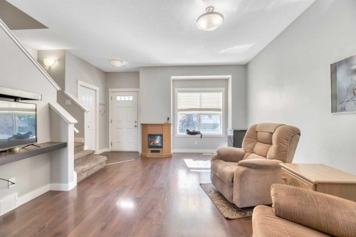 238 Ranch Ridge Meadow, Strathmore, AB - Indoor Photo Showing Other Room With Fireplace