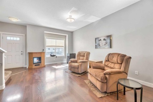 238 Ranch Ridge Meadow, Strathmore, AB - Indoor Photo Showing Living Room With Fireplace
