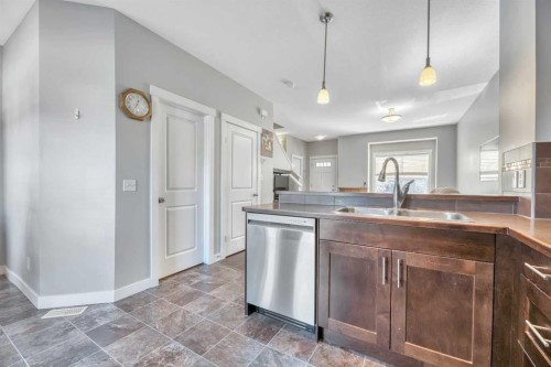 238 Ranch Ridge Meadow, Strathmore, AB - Indoor Photo Showing Kitchen With Double Sink