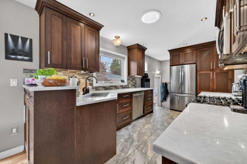 2023 Glenwood Drive Sw, Calgary, AB - Indoor Photo Showing Kitchen With Stainless Steel Kitchen