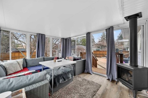 2023 Glenwood Drive Sw, Calgary, AB - Indoor With Fireplace