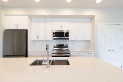5403-20295 Seton Way Se, Calgary, AB - Indoor Photo Showing Kitchen With Double Sink With Upgraded Kitchen