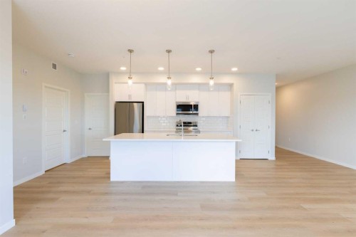 5403-20295 Seton Way Se, Calgary, AB - Indoor Photo Showing Kitchen With Stainless Steel Kitchen With Upgraded Kitchen